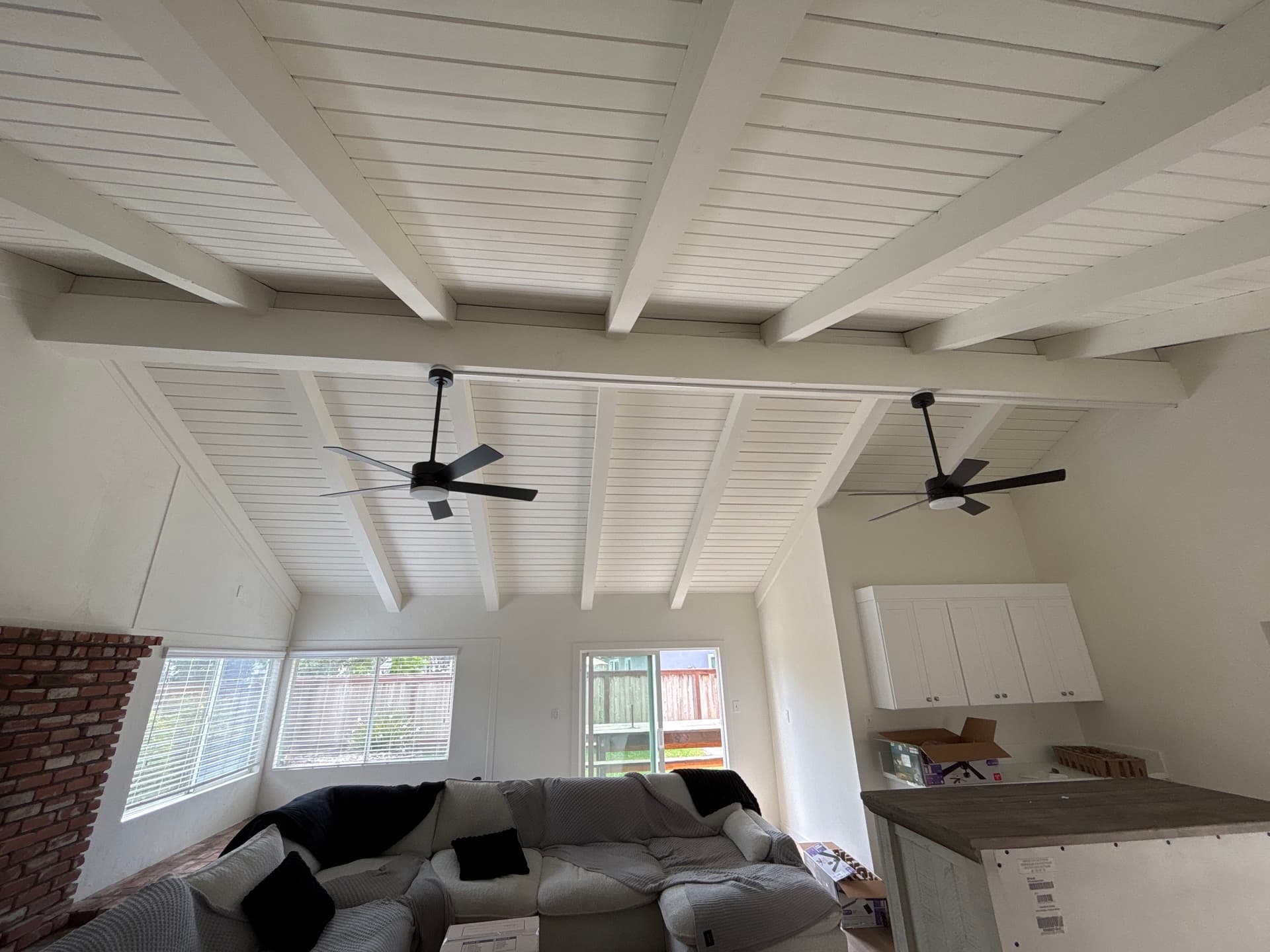 Dual Ceiling Fan Install on Exposed Beam Living Room Ceiling image