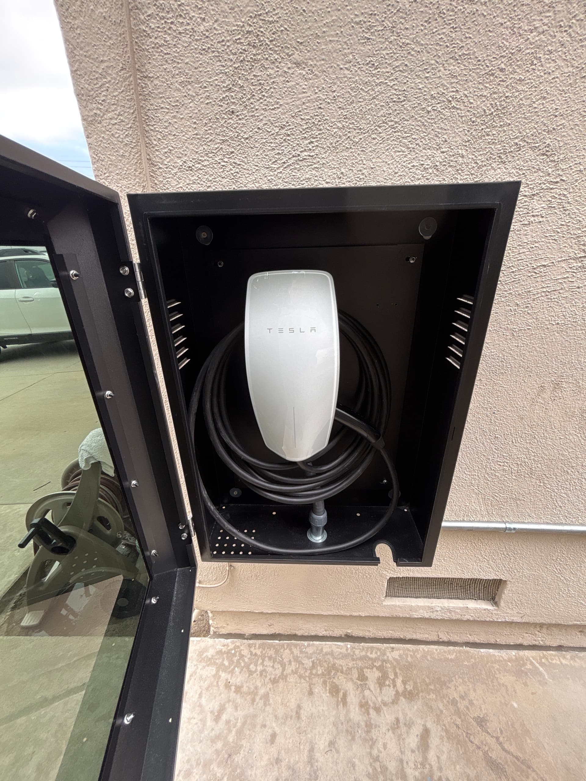 Tesla Wall Connector Installed in a Secure Lockable Enclosure image