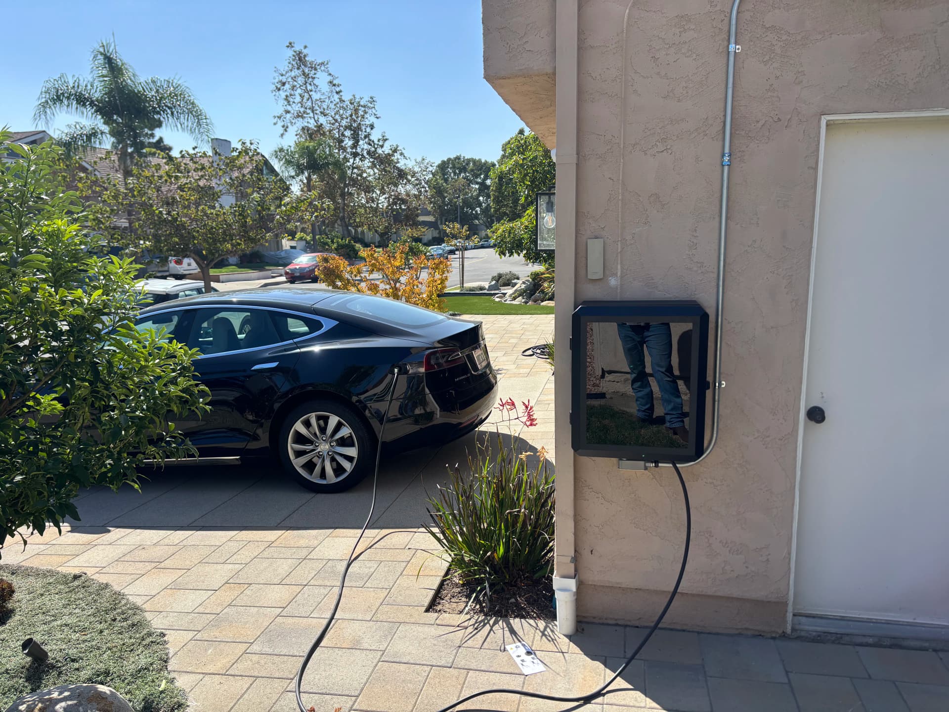 Tesla Universal Wall Connector Installed with a Security Enclosure image